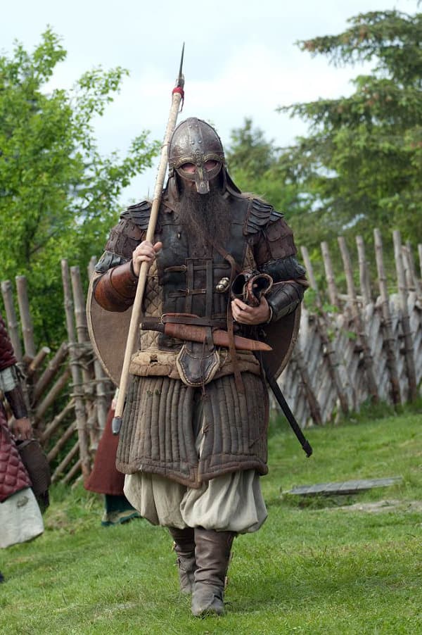 Warrior in historical armour with a spear